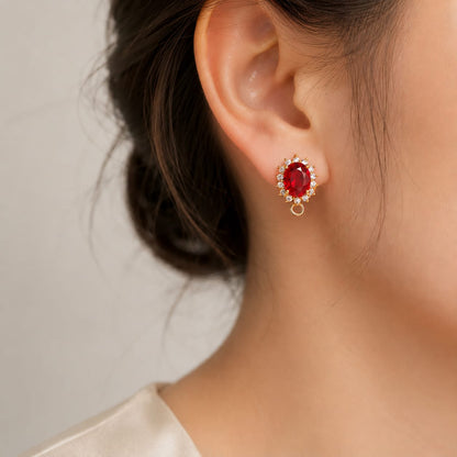 Boucles d'oreilles élégantes ornées d'un précieux bijou breloque ovale