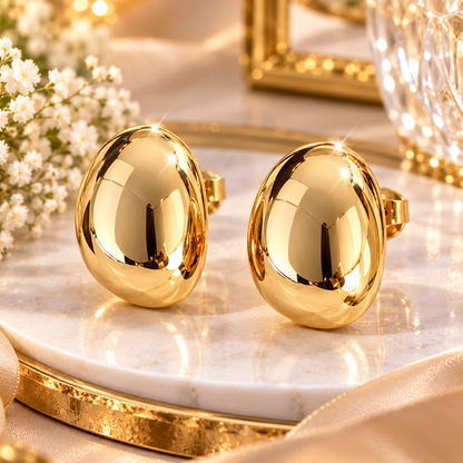 Boucles d'oreilles ovales bombées légères au design ergonomique.