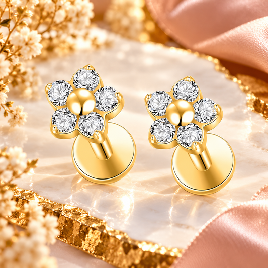 Boucles d_oreilles fleurs dorees scintillantes