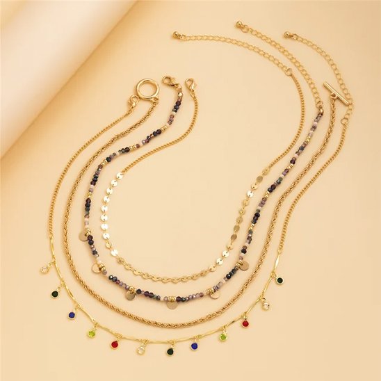 Collier femme multi-chaînes dorées aux perles bleues et rouges
