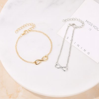 Bracelet femme raffiné avec chaînette d’extension, design minimaliste et symbole de lien indéfectible, idéal cadeau sentimental.