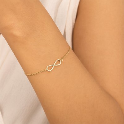 Bracelet femme symbole infini en or ou argent, chaîne délicate et fermoir ajustable, parfait pour un style élégant au quotidien.